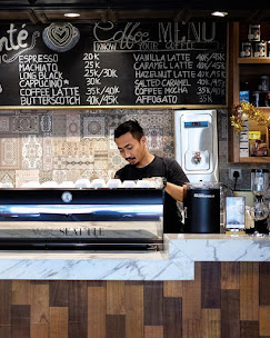 Barista preparing coffee at the counter