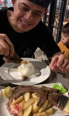 Grilled ribs with rice — signature meal